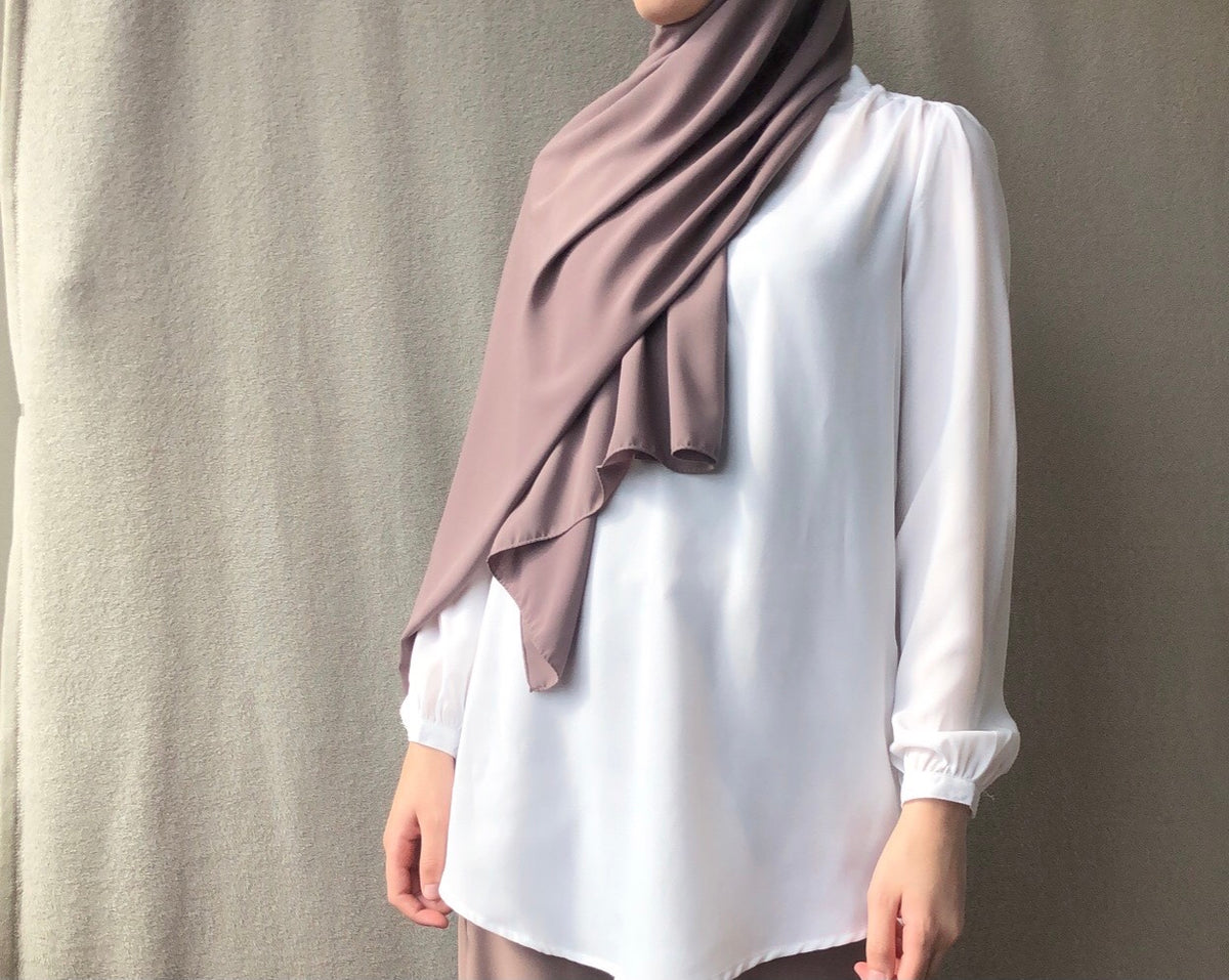 Witte blouse met knopen